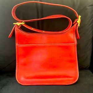 Vintage Coach Legacy bag.  Red leather with gold hardware. Dimensions in photos